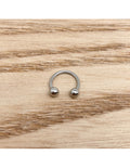 Piercing nez fer à cheval 1/8